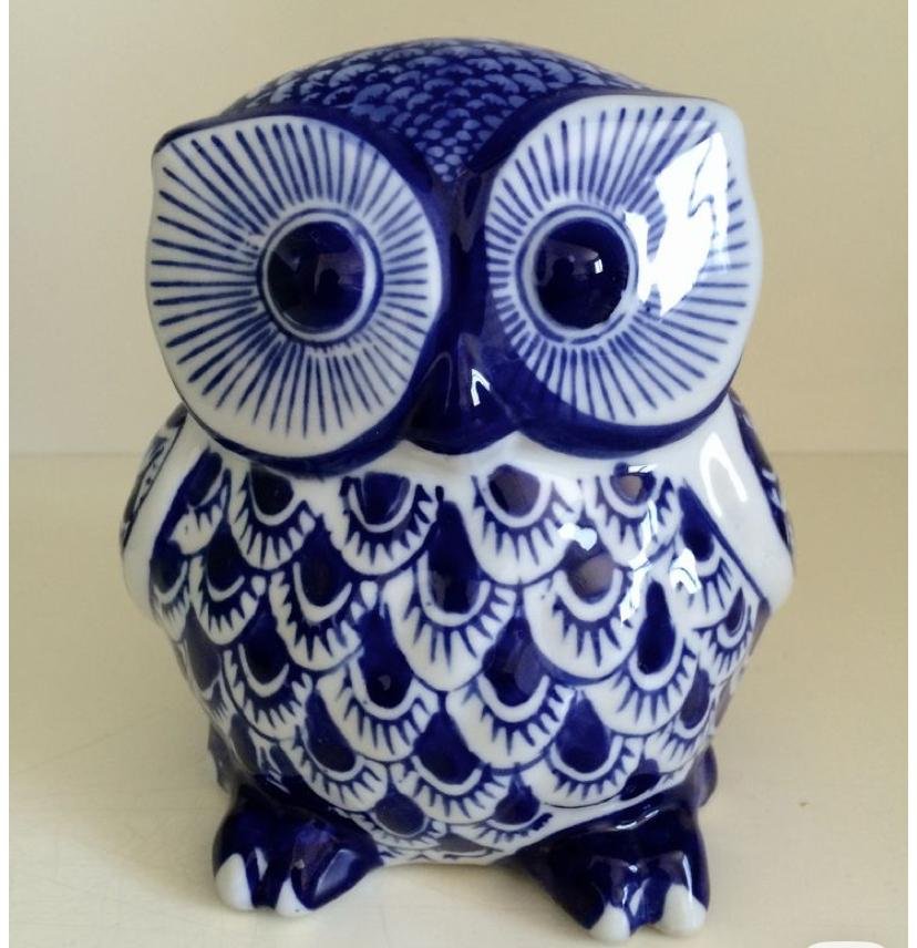 blue and white ceramic owl figurine